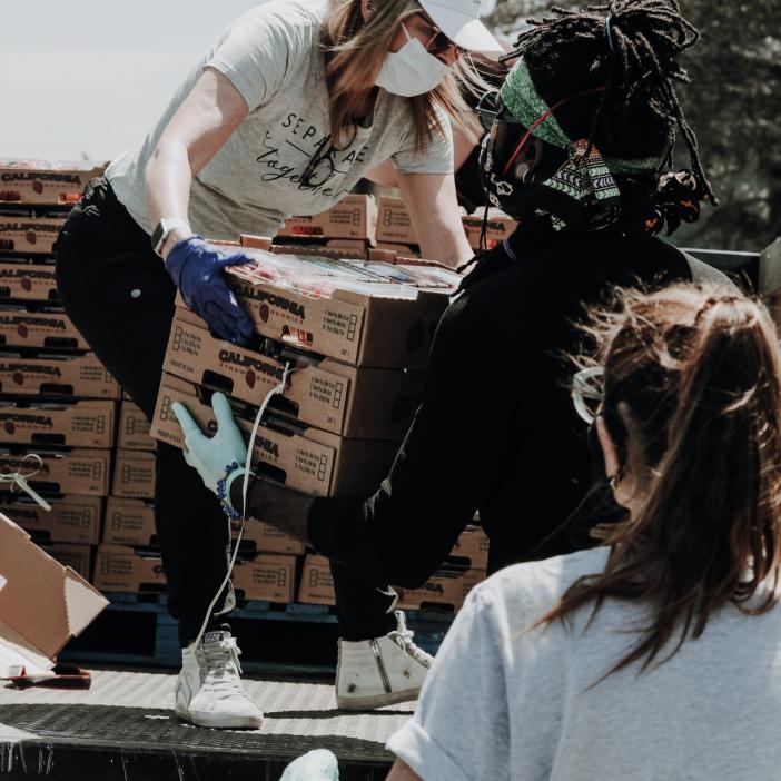 person delivering supplies from truck