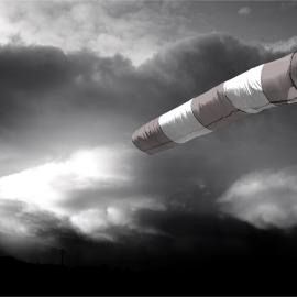 A windsock aids navigation amidst a brewing storm